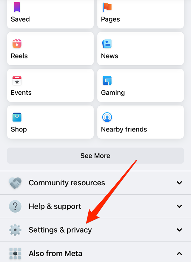Screenshot of Facebook's menu screen with a red arrow pointing at "Settings & privacy"