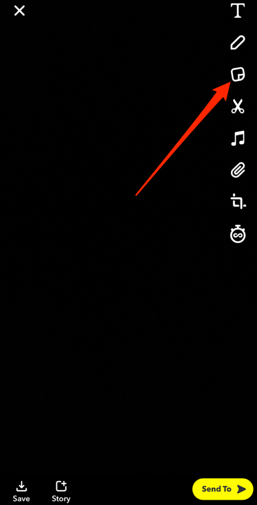 Screenshot of Snapchat's Snap editing screen with a red arrow pointing at the Stickers icon on the right side of the screen