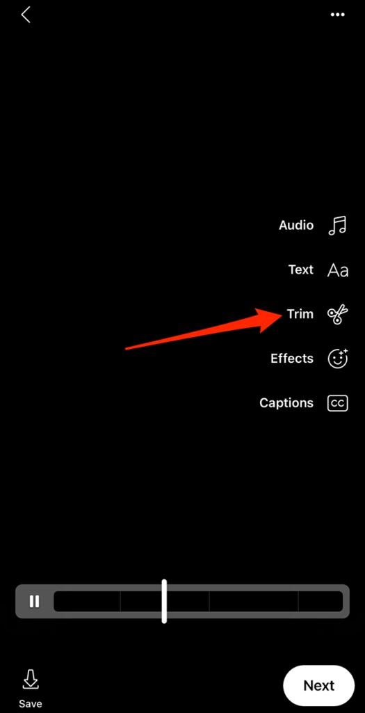 Screenshot of the Facebook Reels editing screen with a red arrow pointing at "Trim" on the right side of the screen