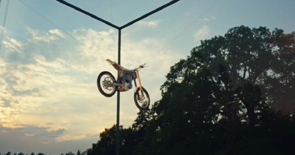 e-Dirt Bike Glass Box Stunt Represents Automaker’s Eco Plan
