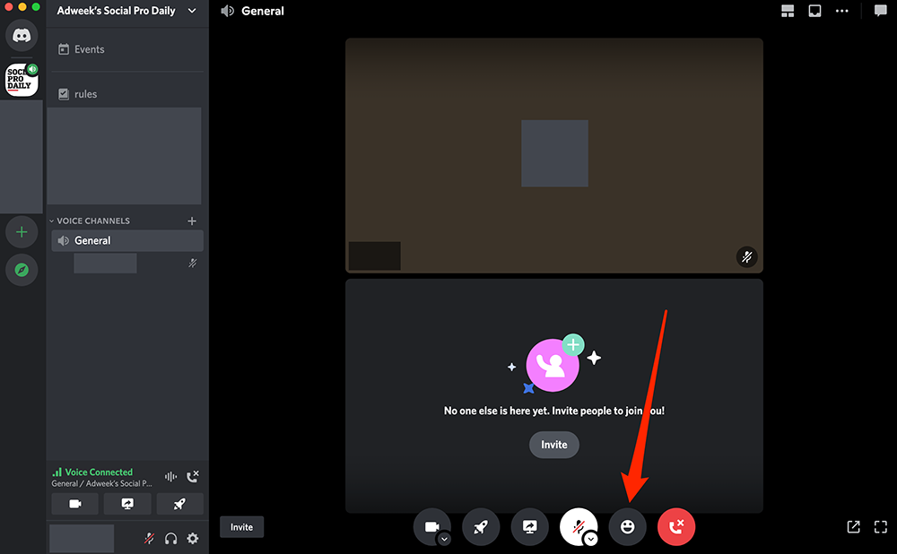 Screenshot of a voice channel in the Discord desktop application with a red arrow pointing at the smiling face icon at the bottom of the screen